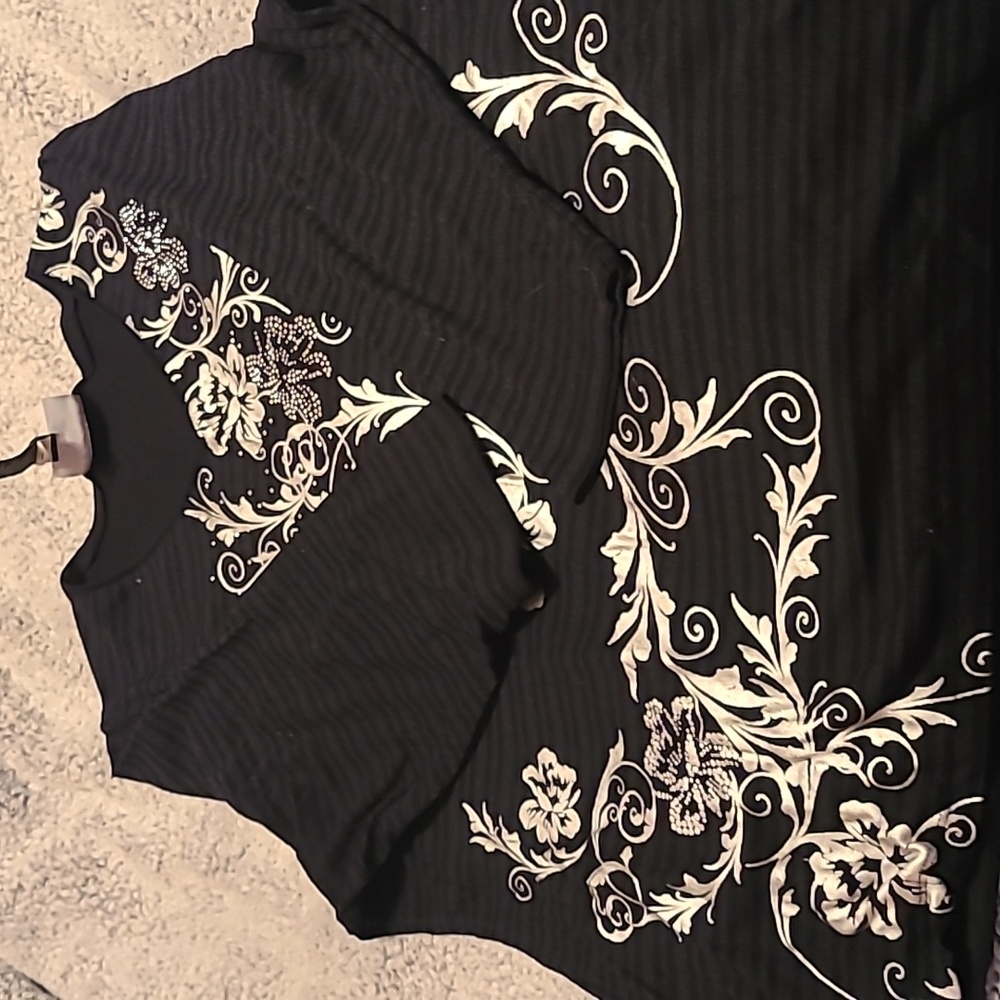 Womens black with silver design  3/4  length top .